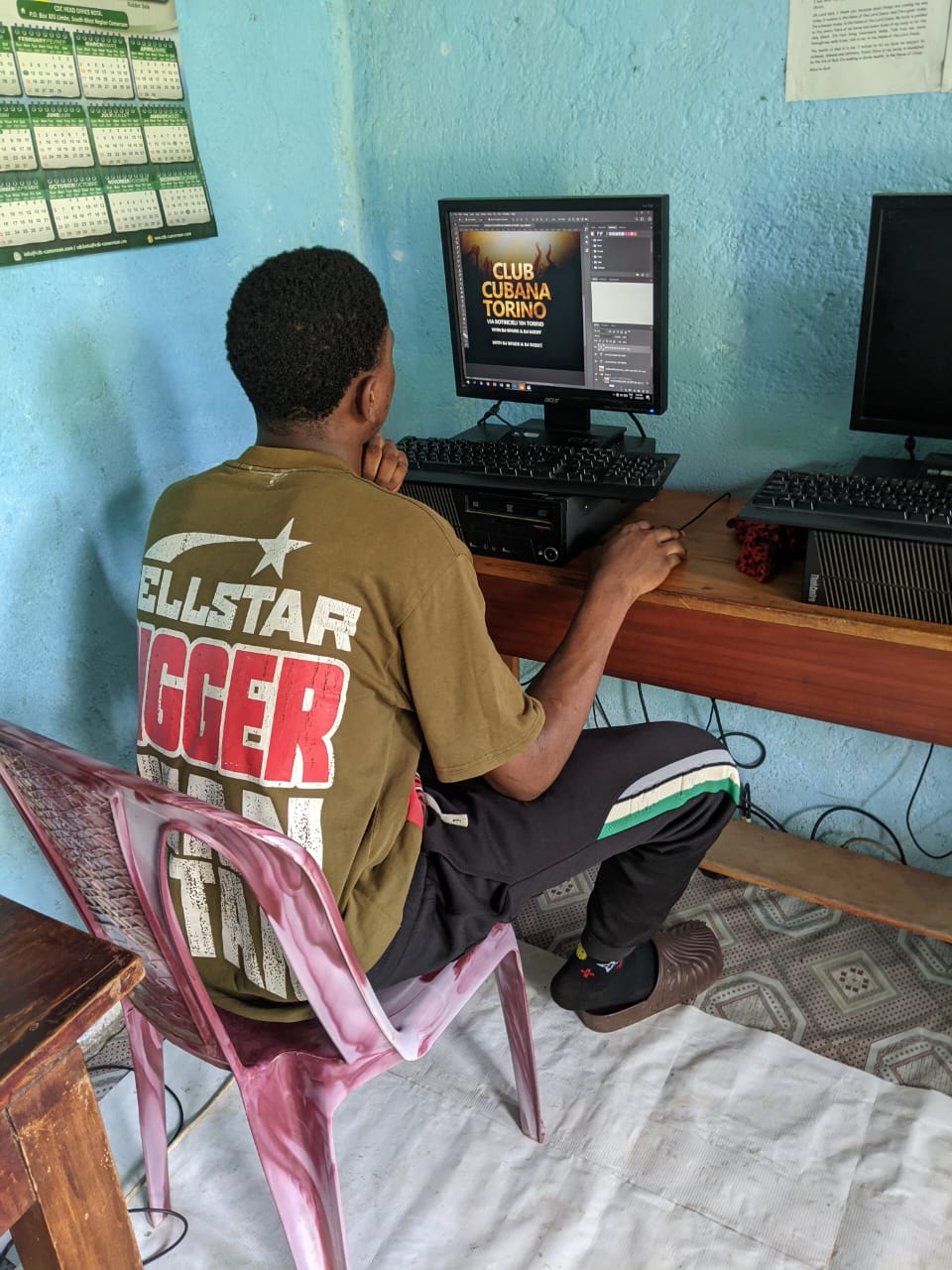 Adult students learning on computers